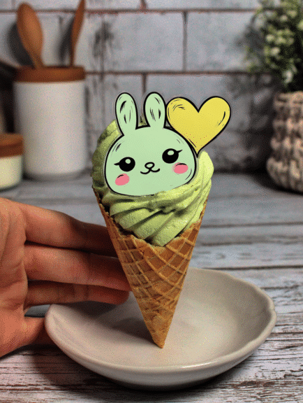 Cute Labubu bunny ice cream cone with pastel green frosting and heart decoration