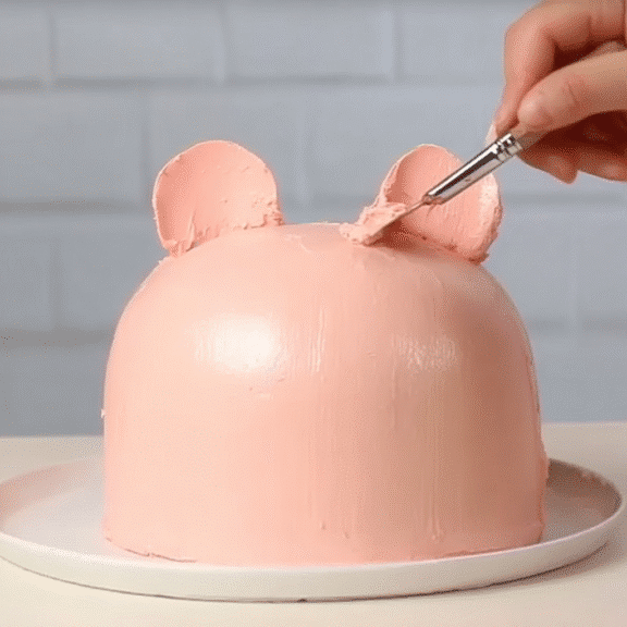 Pink dome cake with buttercream ears for Labubu cake design