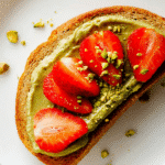 Pistachio butter toast with strawberries