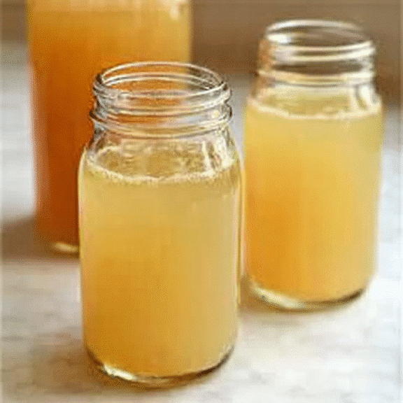 Mason jars filled with apple cider vinegar drink